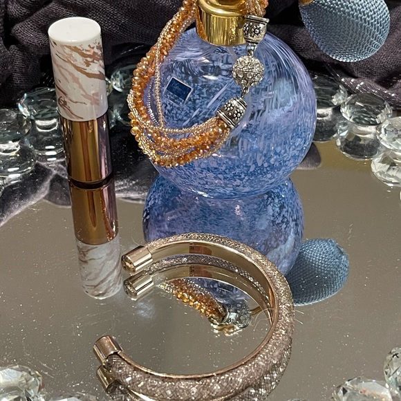 Two bracelets. Gold-tone bangle w/glass beads, gold-beads w/silver-tone clasp. - Picture 1 of 4